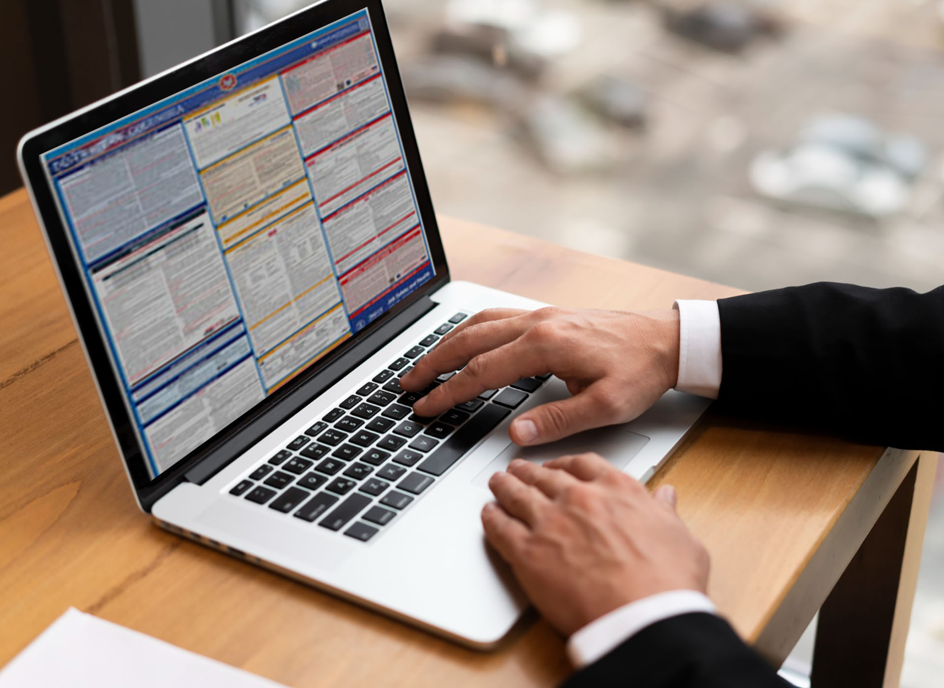 Laptop with labor law poster graphic