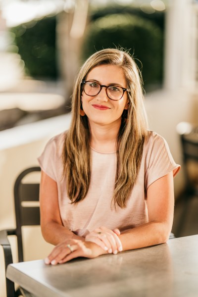 Emily woman sitting at desk